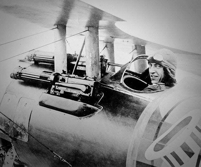 pilot wearing first flight jacket.